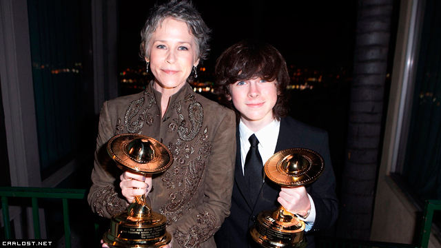 Melissa McBride y Chandler Riggs en los Saturn Awards 2014